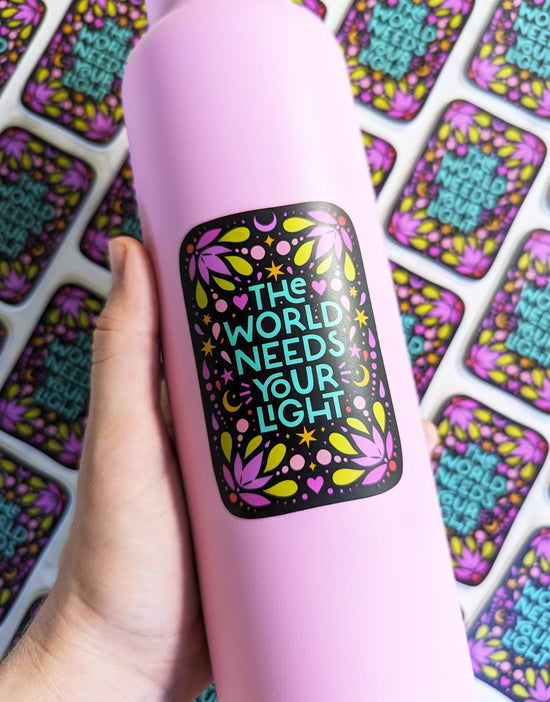 "The World Needs Your Light" Waterproof Sticker