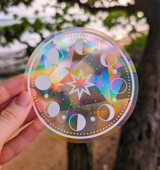 Moon Phases & North star round suncatcher sticker on colorful rainbow prismatic film